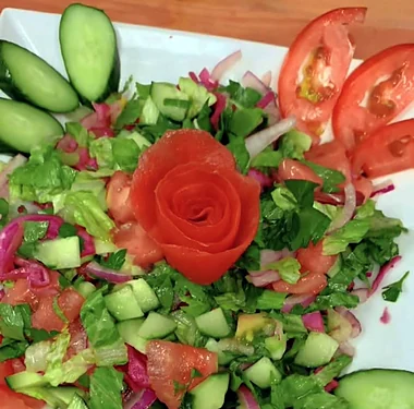 Turkish salad with a tomato rose